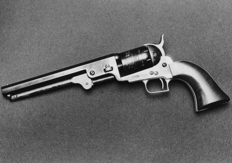 An 1851 Colt Navy revolver replica model. In 1830 a 16-year-old Samuel Colt sat on the brig of the Corlo, a sailing boat, and according to <a href="https://books.google.co.uk/books?id=TiEDAAAAMBAJ&pg=PA88&lpg=PA88&dq=The+Story+of+Sam+Colt%27s+Equalizer%22.+Popular+Science.&source=bl&ots=mw4RQhDOkH&sig=E5XwtH95nH76-4wWHfwnthG4mos&hl=en&sa=X&ved=0ahUKEwjf9rLVnd3ZAhWEjKQKHcG2Be4Q6AEIKTAA#v=onepage&q=The%20Story%20of%20Sam%20Colt's%20Equalizer%22.%20Popular%20Science.&f=false" target="_blank" target="_blank">Popular Science</a> observed the mechanics of the wheel and how each spoke came into line with the clutch. Inspired, he whittled a wooden model of a prototype revolver, which he took home and showed to his father, who had a gunsmith make two. Neither worked. Trials and tribulations followed for the young Colt, but by <a href="https://www.britannica.com/biography/Samuel-Colt" target="_blank" target="_blank">1836</a> he had a patent in the United States, and by his death in 1862 his company was manufacturing 16 models and had produced 450,000 guns.  