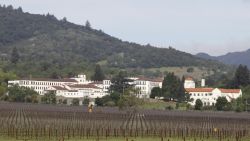 File - In this April 17, 2011 file photo, vineyards are shown in front of the Veterans Home of California in Yountville, Calif. Napa County Fire captain Chase Beckman says a gunman has taken hostages Friday, March 9, 2018, at the veterans home. Police closed access to the large veterans home in Yountville after a man with a gun was reported on the grounds.