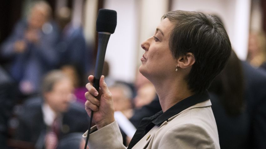 Florida Rep. Elizabeth Porter (R-Lake City) raises her microphone to ask a question during the school safety bill on the House floor at the Florida Capital in Tallahassee, Fla., Tuesday March 6, 2018. (AP Photo/Mark Wallheiser)