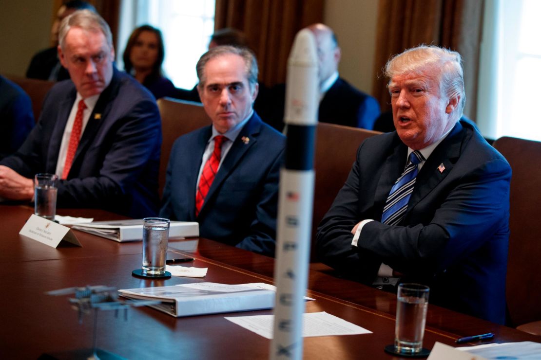 Secretary of Veterans Affairs David Shulkin, center, listens as President Donald Trump speaks during a cabinet meeting at the White House, Thursday, March 8, 2018, in Washington. (AP/Evan Vucci)