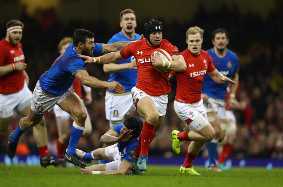 Wales swept to a convincing 38-14 win over Italy at the Principality Stadium, where Leigh Halfpenny is seen making a break. 