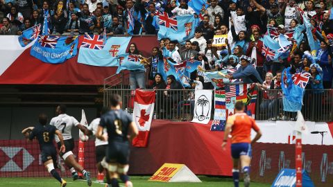 Fiji fans celebrate in <a href=