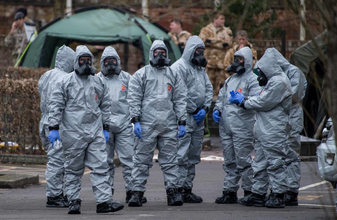 Military personnel wearing protective suits investigate the poisoning of Sergei Skripal in Salisbury, England. 
