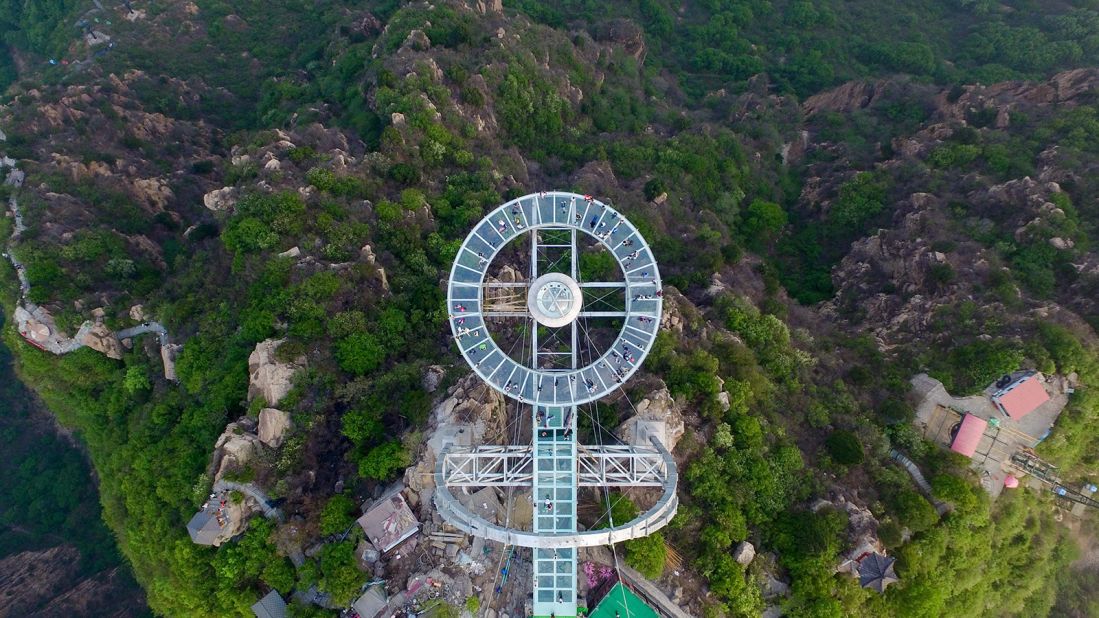 <strong>The world's biggest glass viewing platform at Shilinxia, Beijing: </strong>Jutting 32.8 meters (107 feet) over the edge of a 396 meter (1,300 feet) valley, the Shilinxia Viewing Platform stretches a whole 11 meters farther than Arizona's Grand Canyon Skywalk. 