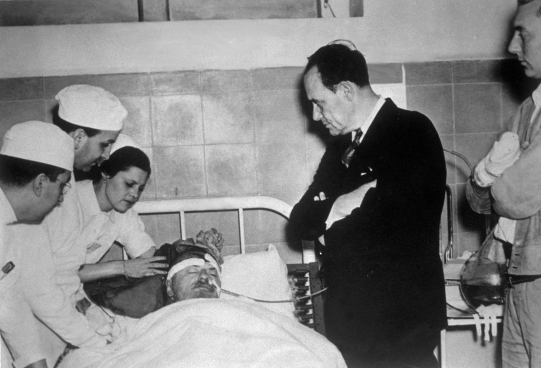 Doctors attend exiled Russian revolutionary leader Leon Trotsky as he nears death in 1940.  