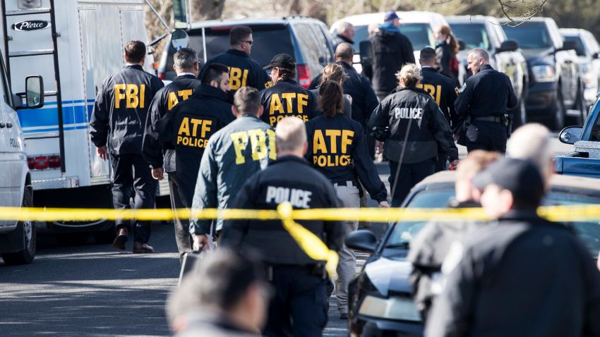 Authorities work on the scene after multiple explosions in Austin on Monday, March 12, 2018. Police are responding to another explosion Monday, that badly injured a woman, hours after a package bomb killed a teenager and wounded a woman in a different part of the city. (Ricardo B. Brazziell/Austin American-Statesman via AP)