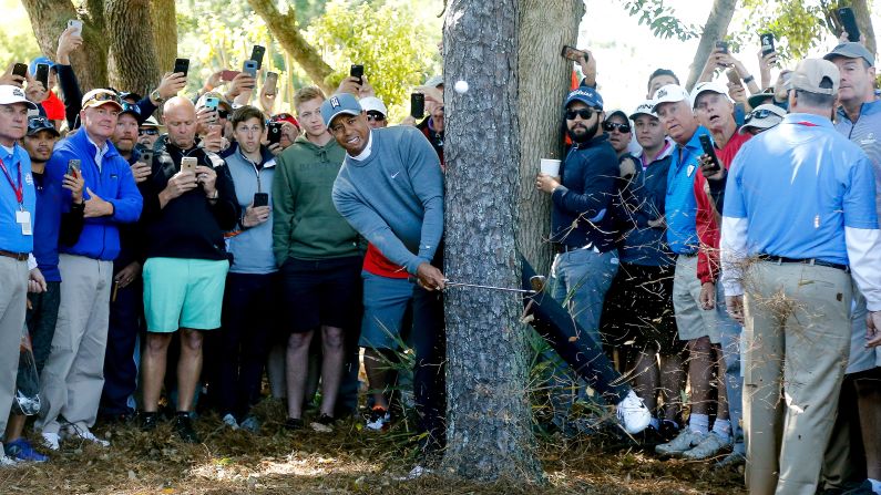 Tiger Woods plays a shot during the first round of the Valspar Championship on Thursday, March 8. He finished the tournament tied for second, one stroke behind winner Paul Casey.