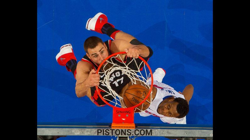 Toronto's Jonas Valanciunas dunks the ball during an NBA game in Detroit on Wednesday, March 7. Toronto clinched a playoff berth with a 121-119 victory in overtime.
