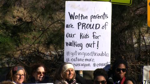 Parents of Cobb County students supported their kids' rights to walkout despite disciplinary threats.