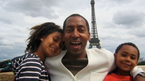 Trey, Ava and Chet Ellis: A family photo in front of the Eiffel Tower.