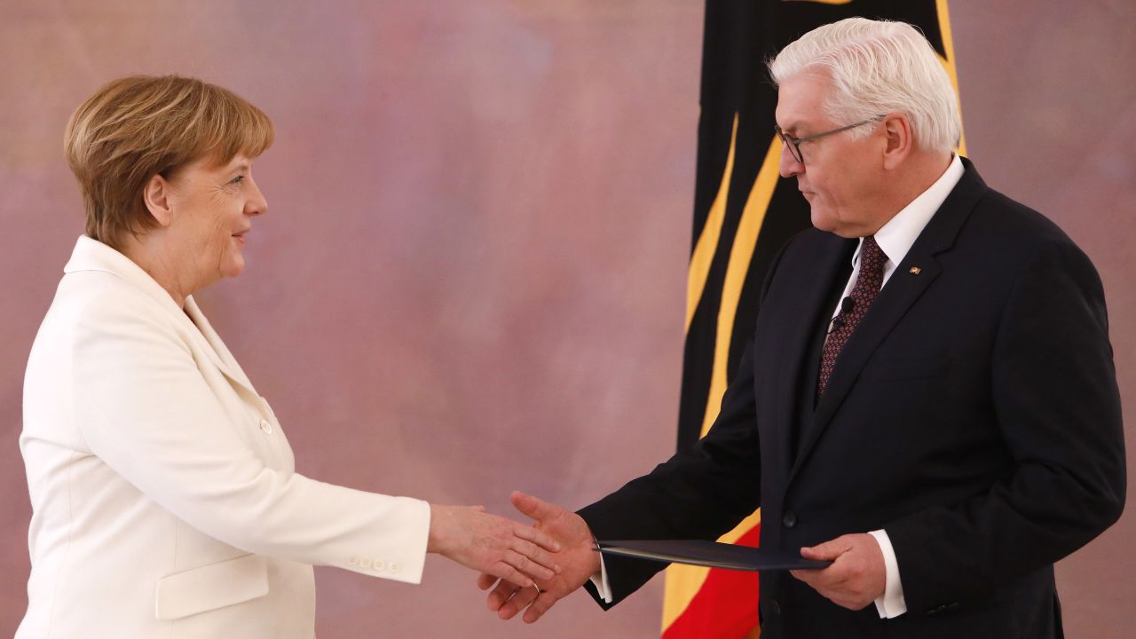 Chancellor Angela Merkel with German President Frank-Walter Steinmeier Wednesday