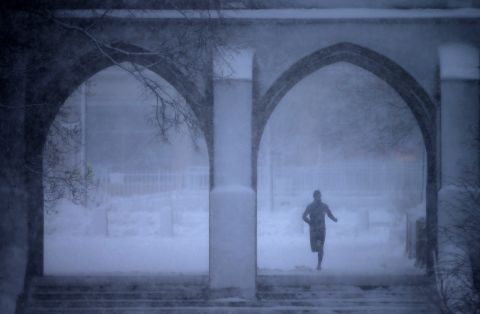 A jogger passes through the Boston University campus on Tuesday, March 13. A winter storm -- <a href="https://www.cnn.com/2018/03/13/weather/northeast-winter-storm/index.html" target="_blank">the third nor'easter in two weeks</a> -- is threatening the region once again.