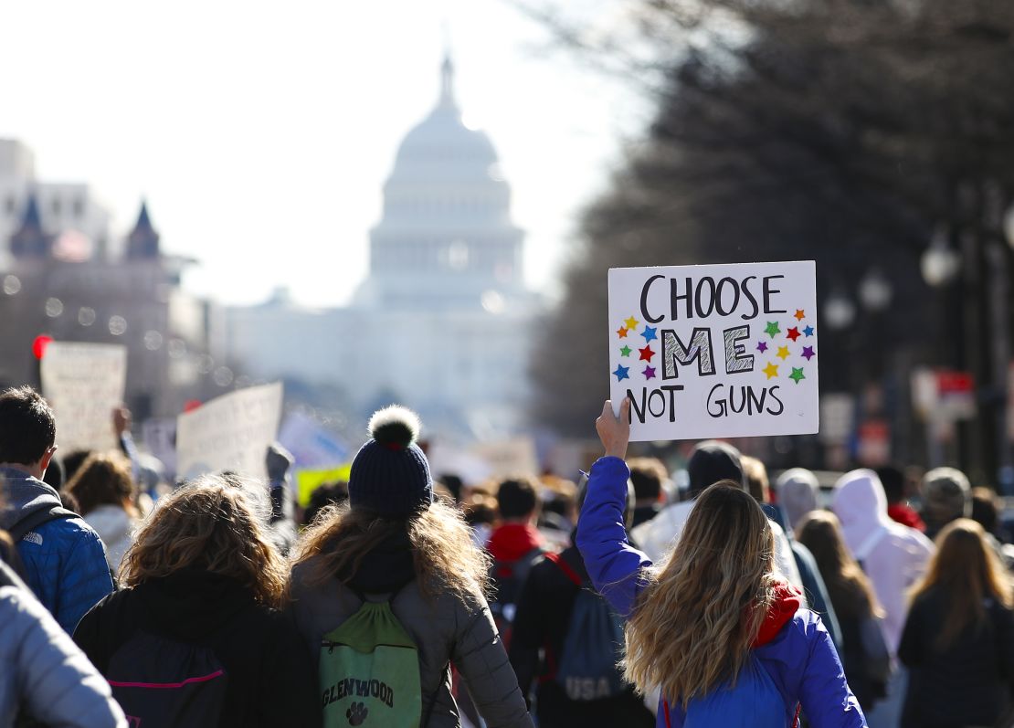 After a rally in front of the White House, students march up Pennsylvania Avenue toward Capitol Hill on  March 14.