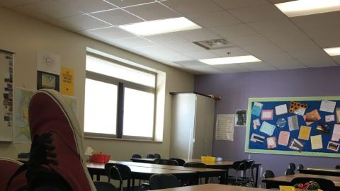 Noah Borba sits in an empty classroom Wednesday. 