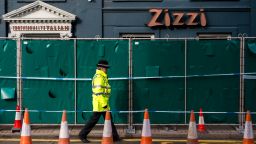 SALISBURY, ENGLAND - MARCH 11:  Police officers stand outside Zizzi restaurant as it remains closed as investigations continue into the poisoning of Sergei Skripal on March 11, 2018 in Salisbury, England. Sergei Skripal who was granted refuge in the UK following a 'spy swap' between the US and Russia in 2010 and his daughter remain critically ill after being attacked with a nerve agent.  (Photo by Chris J Ratcliffe/Getty Images)