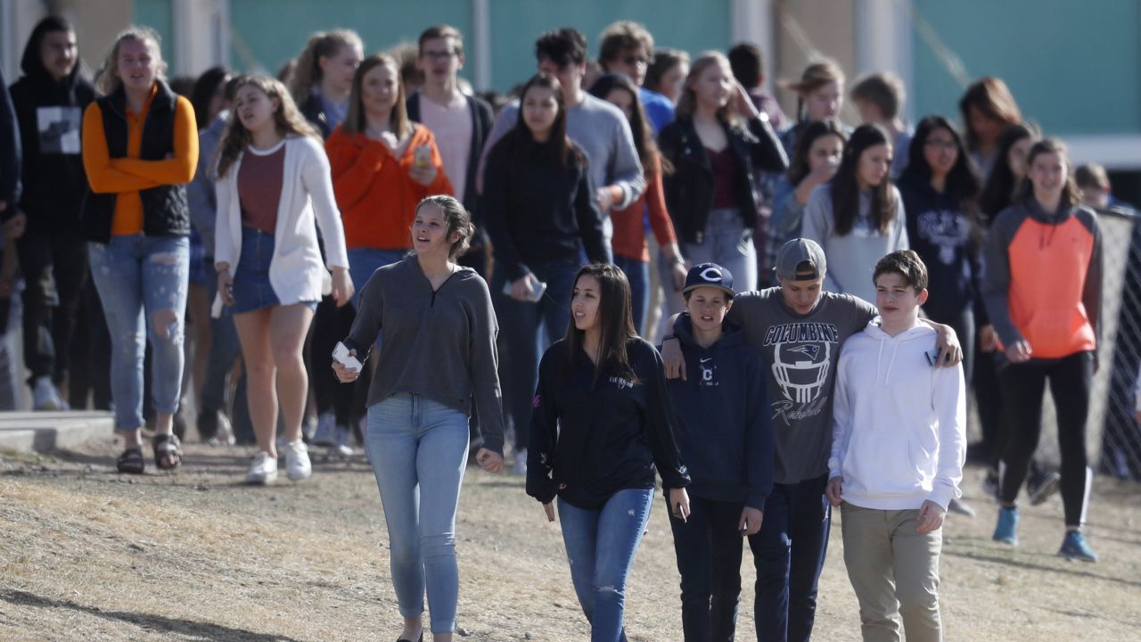 Columbine High School students walk out of class Wednesday in Littleton, Colorado.