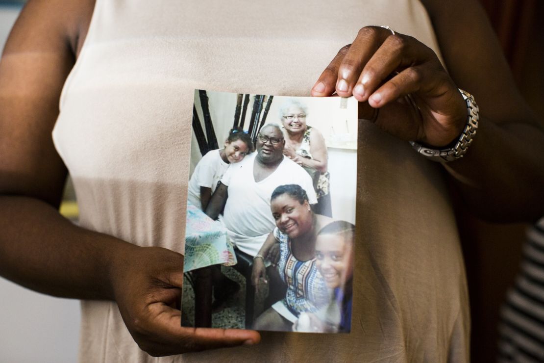 Natalio Rodriguez Lebron, center, is shown with his family.