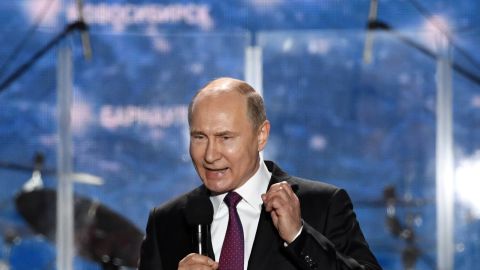 Vladimir Putin addresses supporters celebrating the fourth anniversary of Russia's annexation of Crimea.