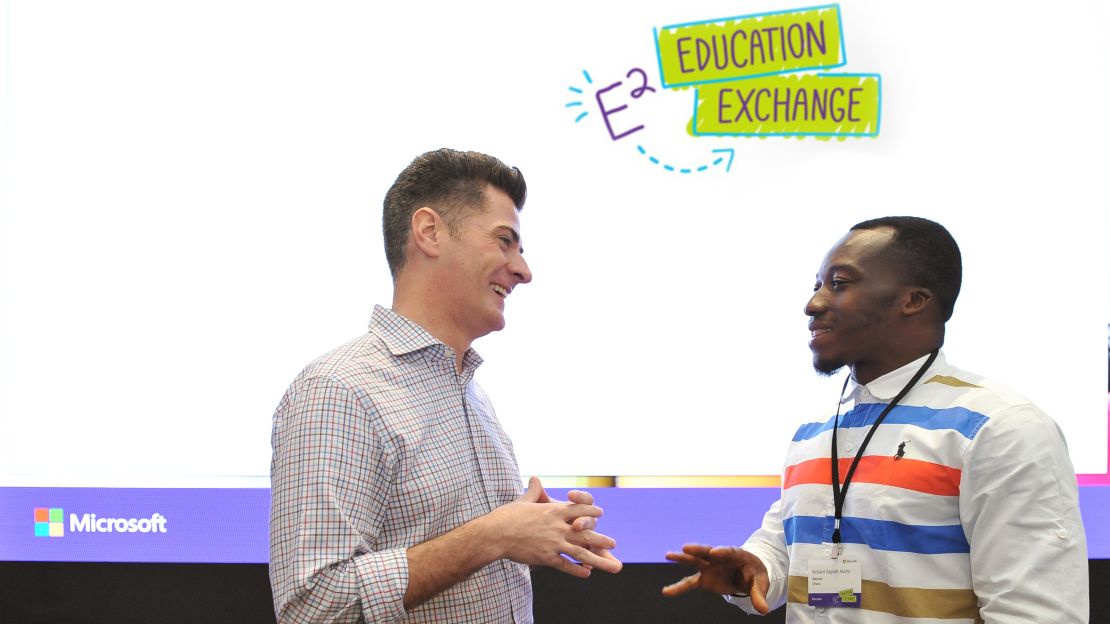 Anthony Salcito, vice president of worldwide education for Microsoft, meets with Richard Appiah Akoto.