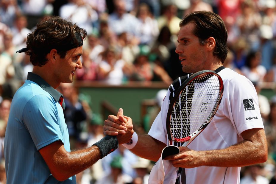 The next day Federer felt the pressure -- his big rival was gone and now he was the favorite -- and almost lost to friend Tommy Haas. 