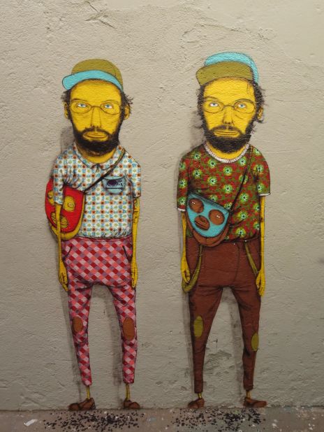 A self-portrait by Brazilian street artists Gustavo and Otavio Pandolfo, collectively known as Osgemeos. 