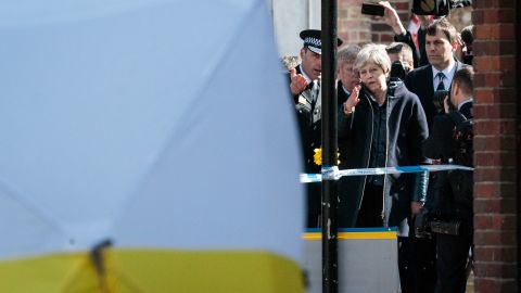 UK Prime Minister Theresa May visits the scene on March 15 where Sergei Skripal and his daughter Yulia were discovered in Salisbury.