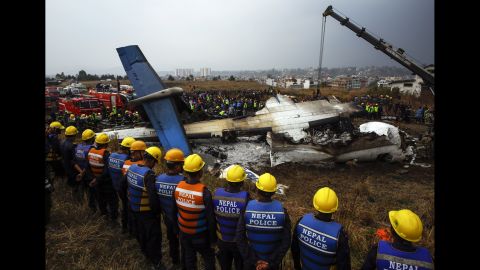 Rescue teams surround the wreckage of a plane that crashed while landing at the Tribhuvan Airport in Kathmandu, Nepal, on Monday, March 12. Flight BS 211, which was flying in from Dhaka, Bangladesh, <a href="https://www.cnn.com/2018/03/12/asia/kathmandu-plane-crash/index.html" target="_blank">crashed and burst into flames</a> after approaching the runway from the wrong direction, officials said. Dozens were killed.