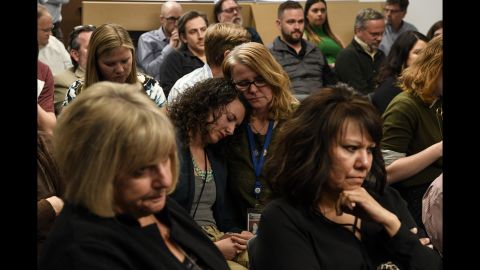 Noelle Philipps, center right, consoles fellow reporter Elizabeth Hernandez as <a href="https://www.denverpost.com/2018/03/14/denver-post-layoffs/" target="_blank" target="_blank">layoffs were announced to the Denver Post newsroom</a> on Wednesday, March 14. Editor Lee Ann Colacioppo announced that 30 newsroom employees would be laid off by April. The newspaper has about 100 newsroom employees right now.