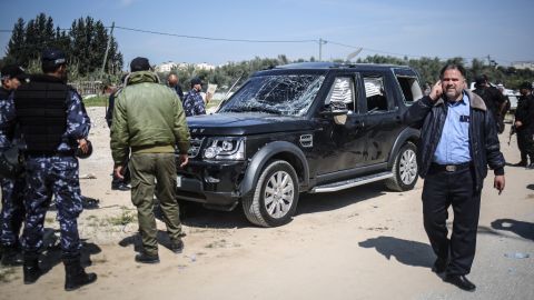 Palestinian security officials inspect a damaged car in Gaza after <a href="https://www.cnn.com/2018/03/13/middleeast/palestinian-pm-gaza-explosion-intl/index.html" target="_blank">a bomb detonated</a> near the convoy of Palestinian Prime Minister Rami Hamdallah on Tuesday, March 13. No one was injured in the attack.