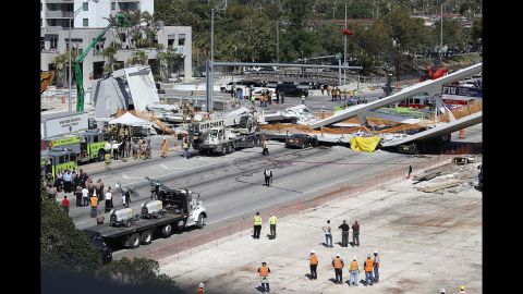 Emergency personnel respond to the scene of a <a href="https://www.cnn.com/2018/03/15/us/miami-bridge-collapse/index.html" target="_blank">deadly bridge collapse in Miami </a>on Thursday, March 15. The bridge was installed Saturday at Florida International University.