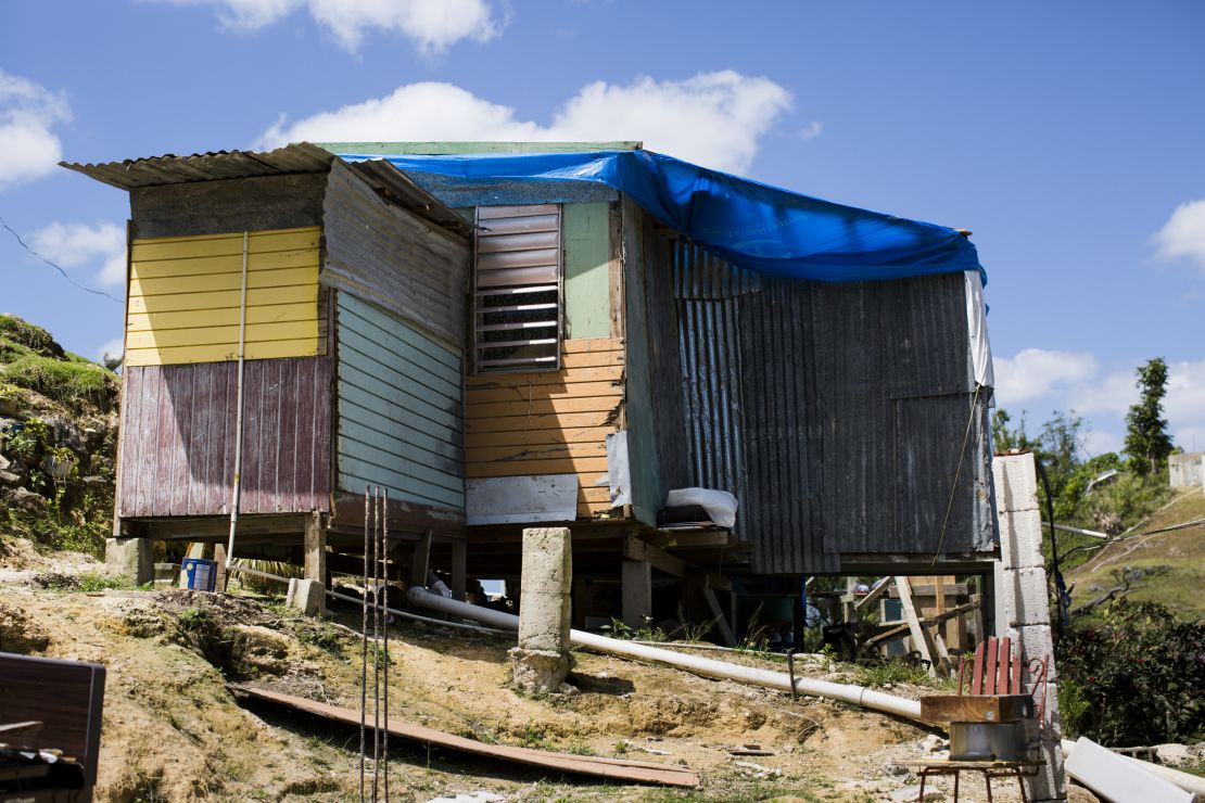 In March, months after Hurricane Maria, a family was living in this house made from scraps in Corozal.