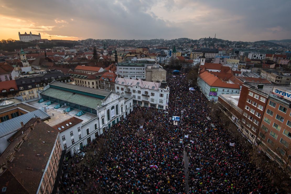 People gather near the Slovak National Uprising square in Bratislava on Friday.