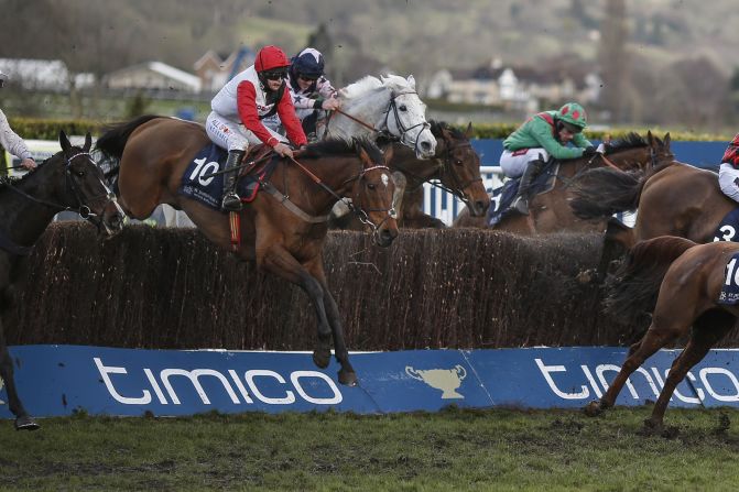 <strong>Pain barrier:  </strong>Teenage jockey Harriet Tucker said she dislocated her shoulder on the final jump on Pacha du Polder in the Foxhunter Chase. That didn't stop her holding out for her first ever Cheltenham victory and second in a row for the horse. 