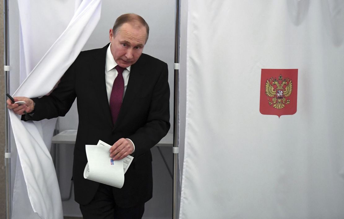 President Vladimir Putin casts his vote in Moscow on Sunday. 