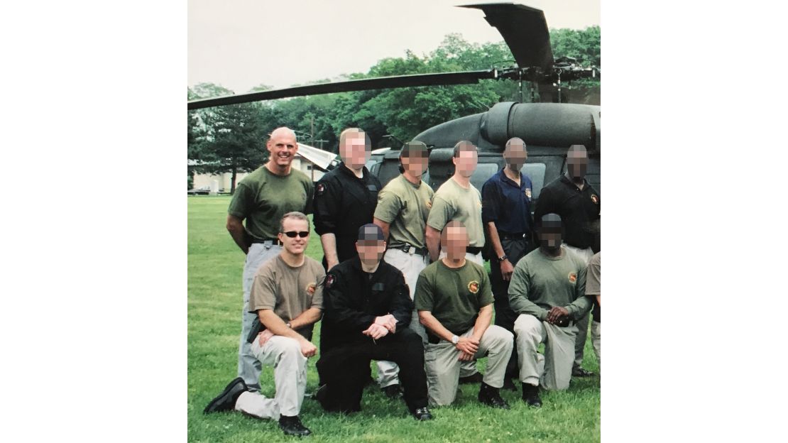 Andrew McCabe (kneeling forefront) and James Gagliano (standing behind) during FBI New York SWAT Team training at Camp Smith, NY, on June 19, 2003.