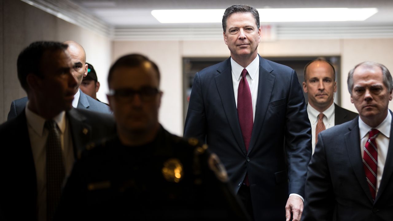 WASHINGTON, DC - JUNE 08: Former FBI Director James Comey leaves a closed session with the Senate Intelligence Committee in the Hart Senate Office Building on Capitol Hill June 8, 2017 in Washington, DC. Comey said that President Donald Trump pressured him to drop the FBI's investigation into former National Security Advisor Michael Flynn and demanded Comey's loyalty during the one-on-one meetings he had with president. (Photo by Drew Angerer/Getty Images)