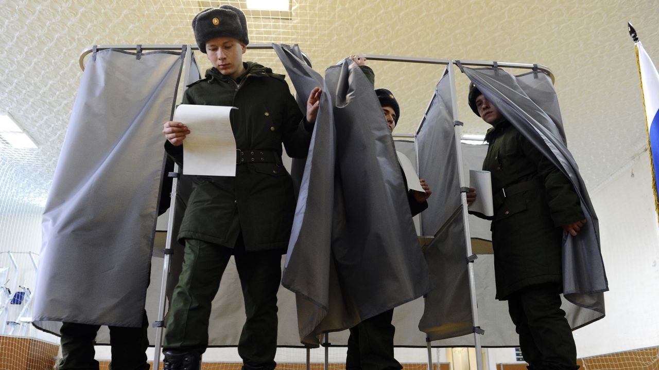 Russian soldiers vote in Rostov-on-Don, Russia on Sunday.