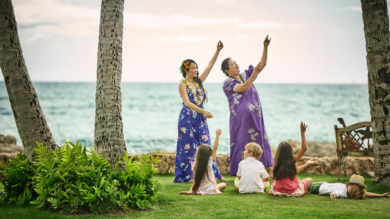 <strong>A class act</strong>: Children take part in a hula lesson at the Four Seasons Oahu, part of the resort's #FSWayfinders program.