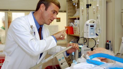 Dr. Wes Ely assessing a patient in the Medical Intensive Care Unit at Vanderbilt.