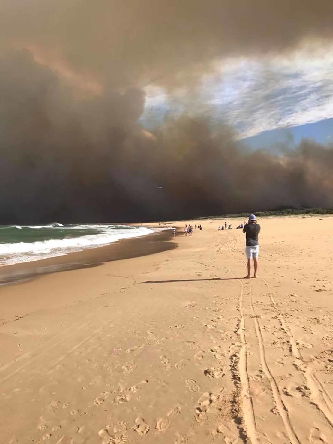 Residents fled to the beach to avoid the flames. 
