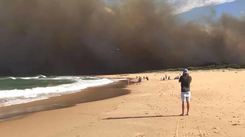 Residents fled to the beach to avoid the flames. 