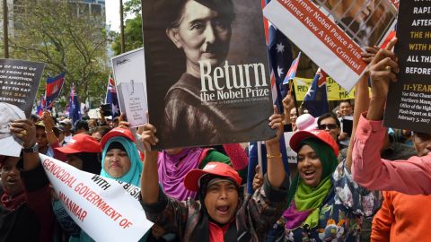 Protesters gather to demonstrate against Suu Kyi during the ASEAN Summit in Sydney on March 17.