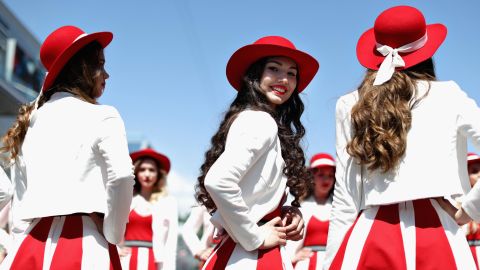 Grid girls are paid "well above" the UK minimum wage, James says.