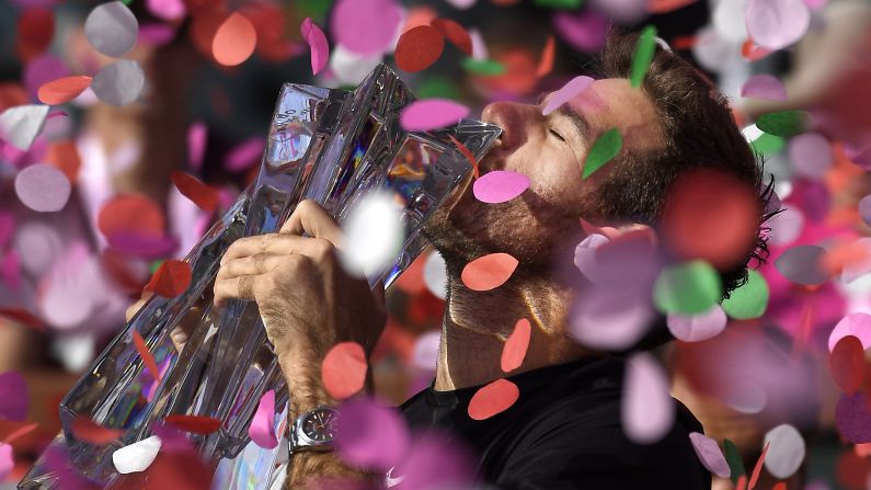 Juan Martin del Potro kisses his trophy after winning the BNP Paribas Open on Sunday, March 18. <a target="_blank">Del Potro defeated Roger Federer</a> in the final.