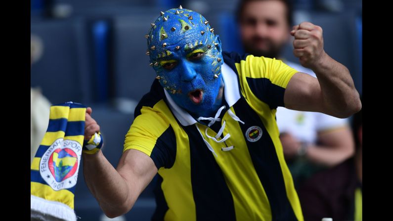A fan of the Turkish soccer club Fenerbache shows his support before a league game against Galatasaray on Saturday, March 17.