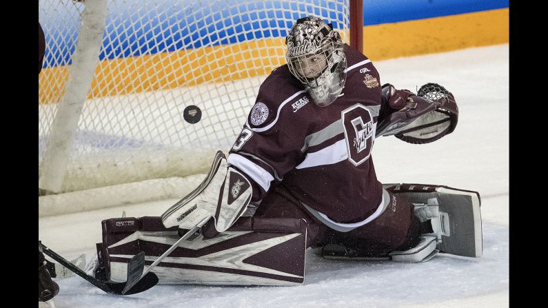 Colgate goalie Julia Vandyk keeps her eye on the puck during the NCAA championship game against Clarkson on Sunday, March 18. Clarkson won 2-1 in overtime for its second straight national title and its third in five years.