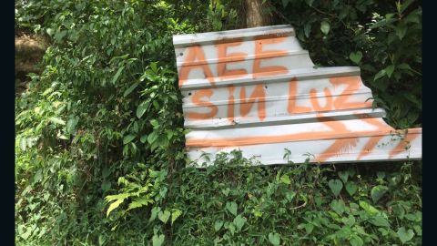 A sign directing the local power authority to an area still without electricity.