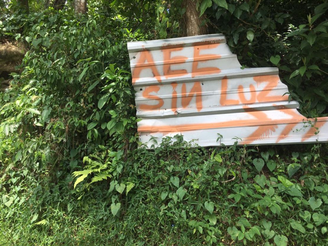 A sign directing the local power authority to an area still without electricity.