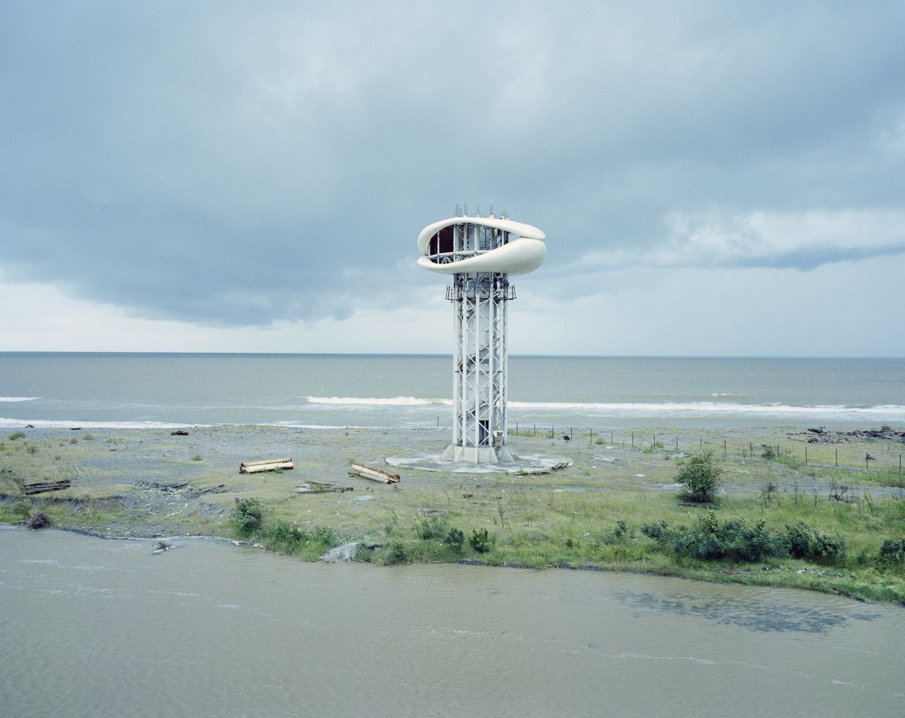 "Anaklia, Georgia" (2013) by Rafał Milach shows an unfinished viewing tower. In 2011, President Micheil Saakashvili announced that Anaklia would be transformed into a luxury resort, but this hasn't come to pass. 