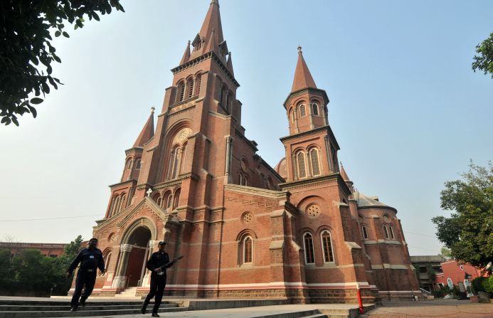 The church has a 165-foot high belfry steeple. 
